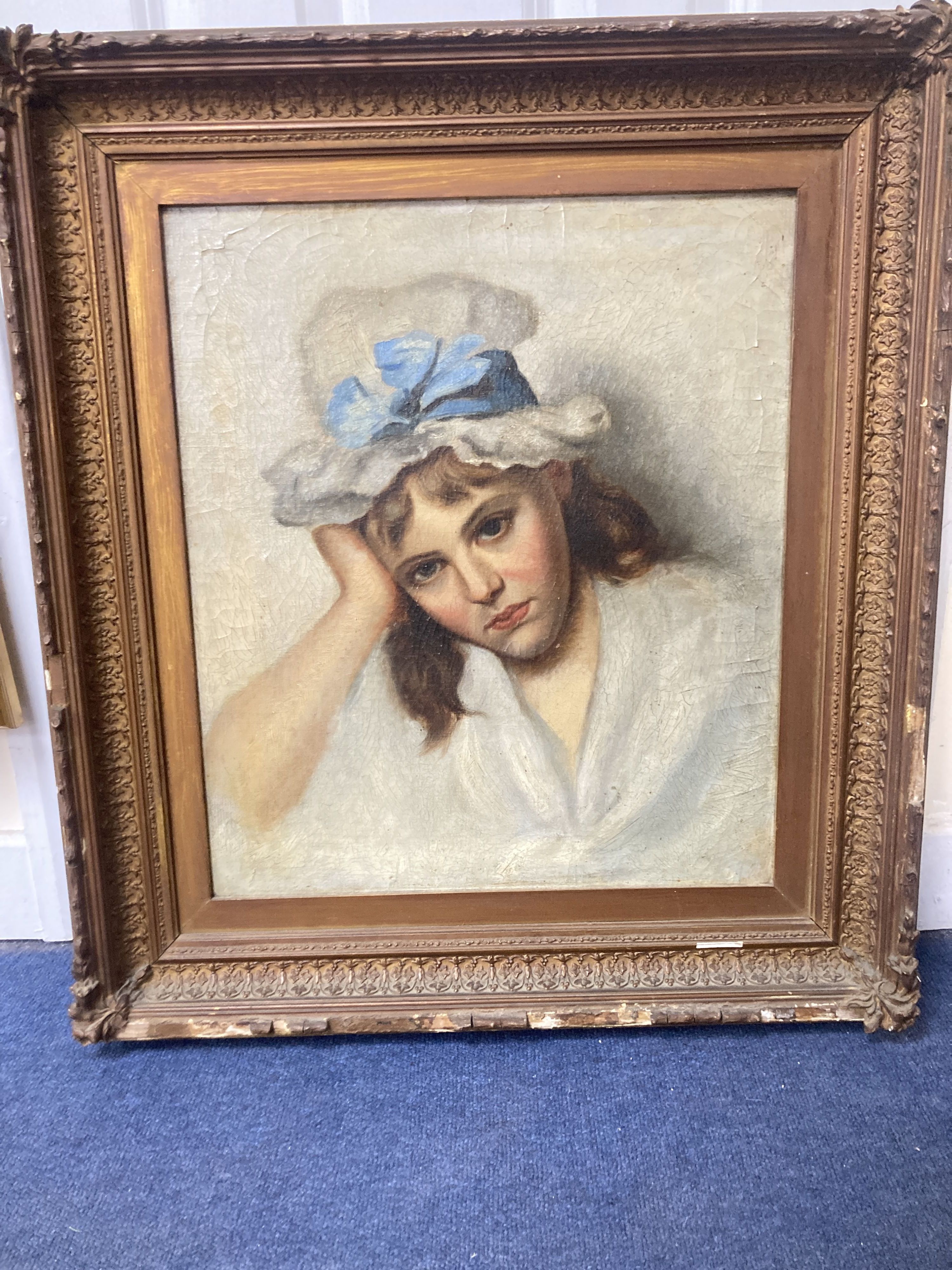 English School c.1900, oil on canvas, Portrait of a young woman wearing a ribbon tied bonnet, 48 x 41cm